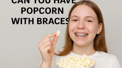 Bowl of popcorn with a braces warning sign, illustrating why popcorn is risky for orthodontic patients
